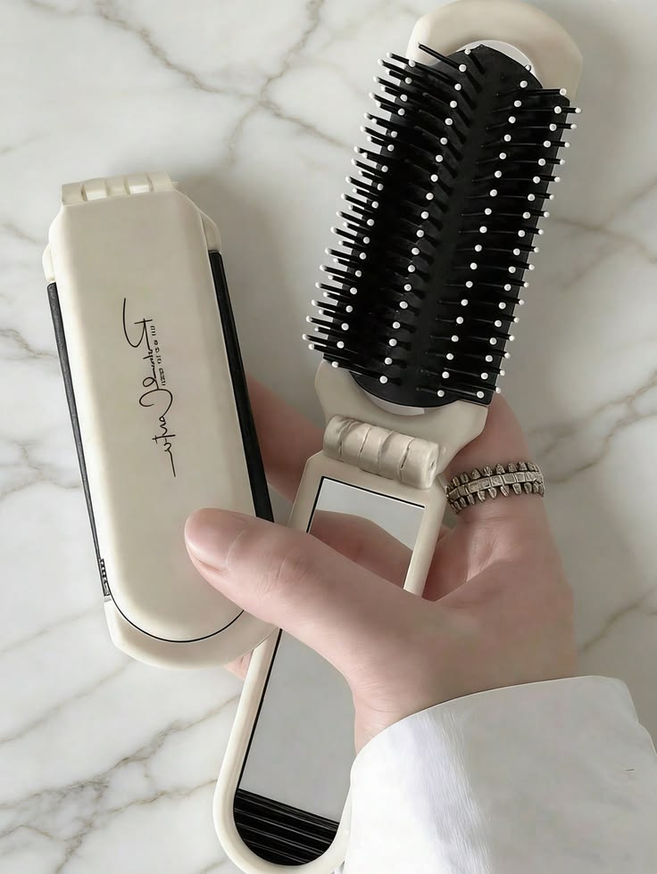 Glammy Groove™ Mirror Hair Brush Your mirror. Your brush. Your everyday beauty essential.